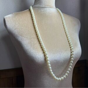 Long faux pearl necklace